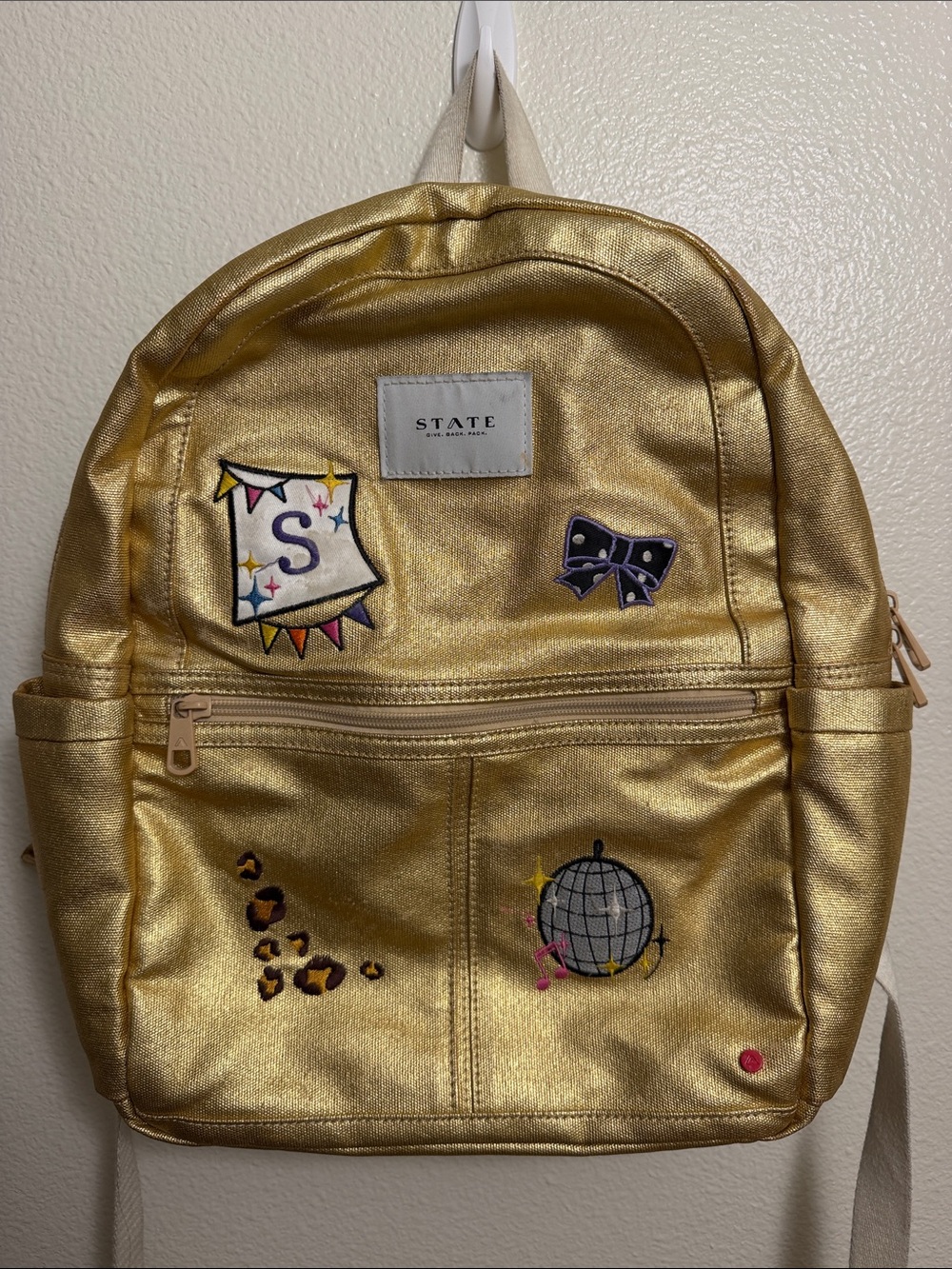 STATE Kids Metallic Gold Backpack with Playful Patch Accents